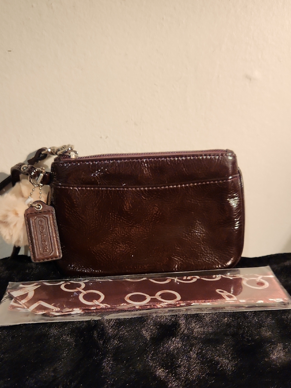 Coach Dark Brown Patent Leather Wristlet with Charm